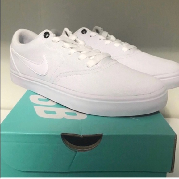 Nike Shoes - NWT all white Women’s Nike Sneakers size 10.5